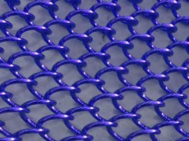 A piece of coil drapery wire mesh in blue color