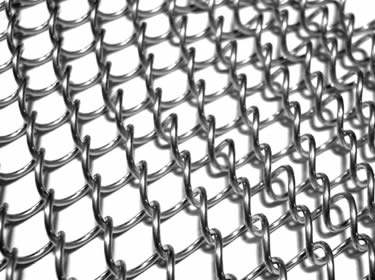A piece of stainless steel coil drapery mesh