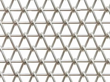 A piece of stainless steel conveyor belt mesh on the white background.