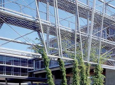 Stainless steel rope mesh used as the wall of passageway between two buildings