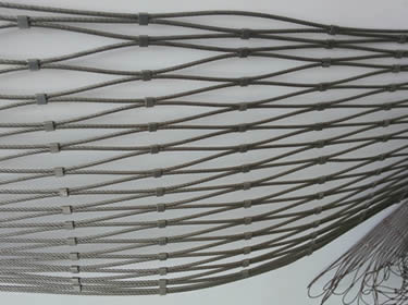 A piece of ferrule stainless steel rope mesh in folded state