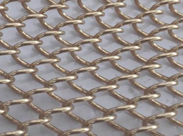 A piece of stainless steel coil drapery wire mesh with 1.2 mm wire